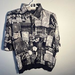 “ESCAPE from the ordinary” Norma Thompson three button, collard shirt